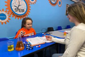 Student working on science project